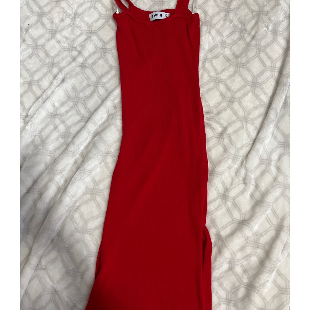 Slits up both sides of dress